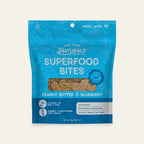 Front of the Peanut Butter & Blueberry Superfood Bites bag from Dog Treat Naturals