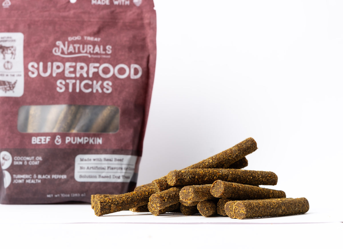 Beef & Pumpkin Superfood Sticks bag with the treats out in front of it