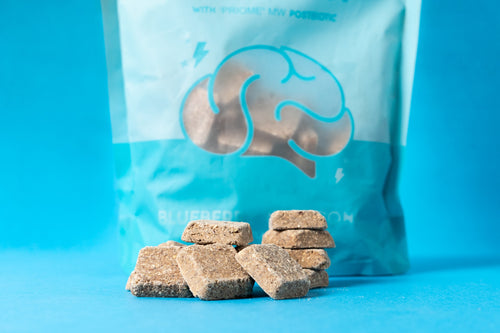 Calming Support Postbiotic Chews out of the bag, close-up of the chews