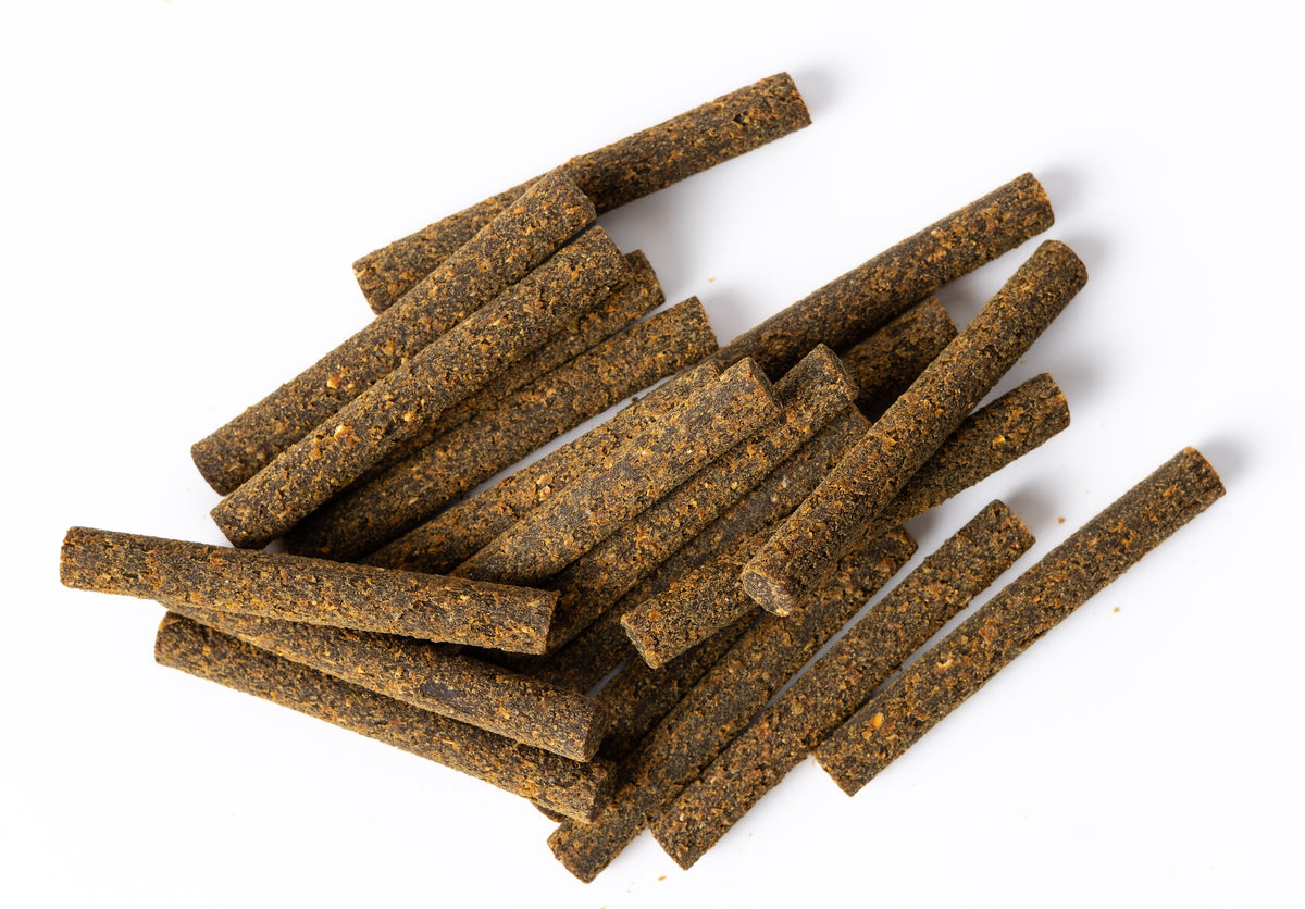 Close-up of Duck & Apple Superfood Sticks showing the real texture