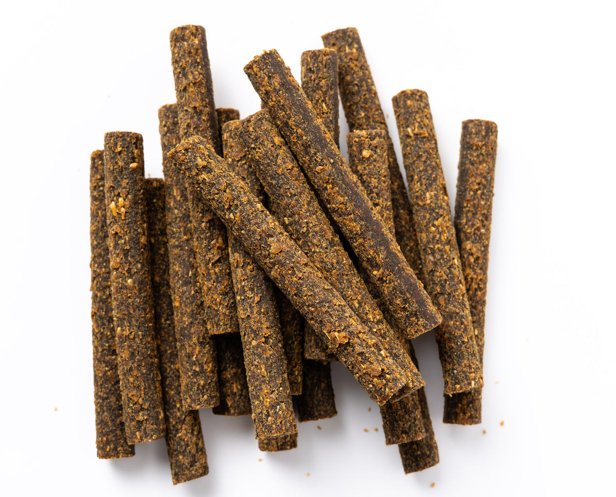 Close-up of Lamb & Date Superfood Sticks showing the real texture