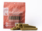 Salmon & Mango Superfood Sticks bag with the treats out in front of it