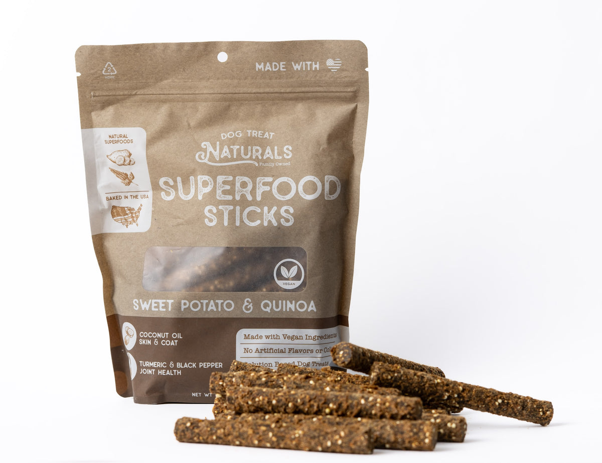 Sweet Potato & Quinoa Superfood Sticks bag with the treats out in front of it