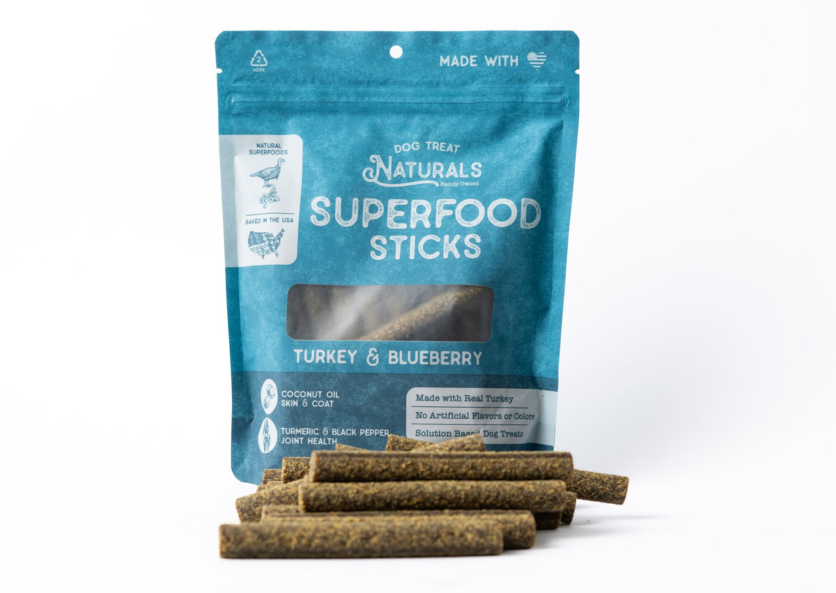 Turkey & Blueberry Superfood Sticks bag with the treats out in front of it